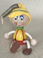 Pérák - dřevěný Pinocchio na pružině velký