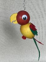Pérák - dřevěný papoušek na pužině červeno-žlutý