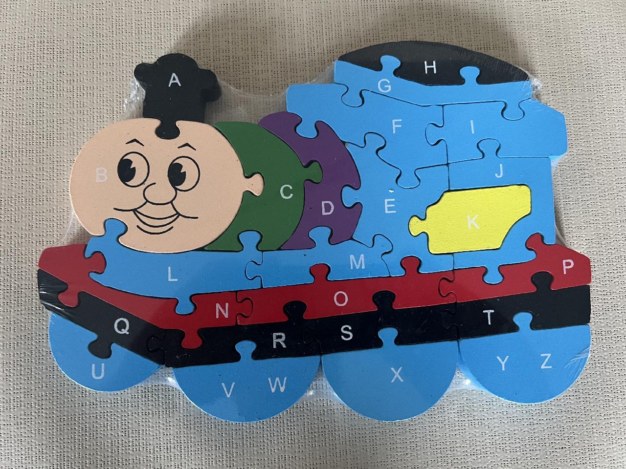 Dřevěné puzzle - mašinka modrá